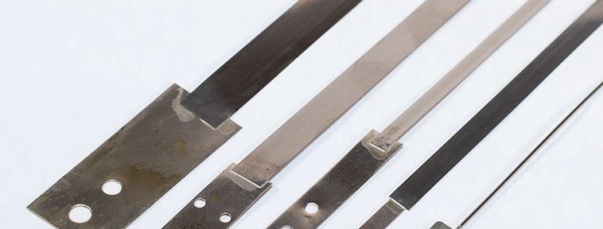 Nichrome heating element with end tabs for impulse heat sealers